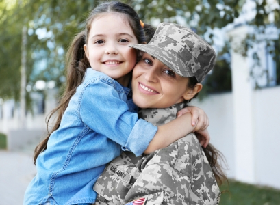 army woman with daughter