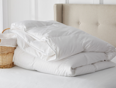 comforter folded on bed