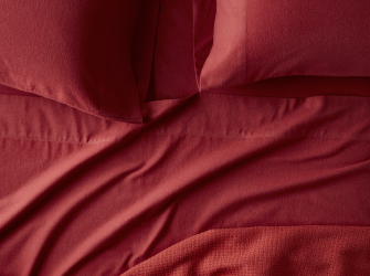 red flannel sheet on bed