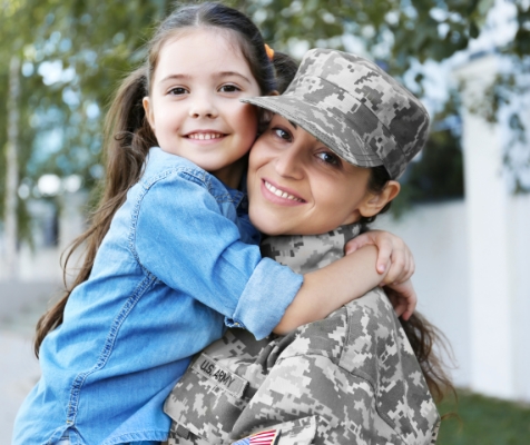 army woman with daughter
