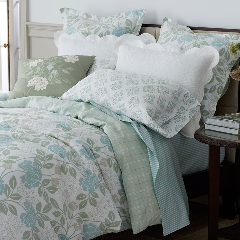 https://companystore-res.cloudinary.com/image/upload/webimages/51195j_pillowcover_mariel_floral_20_sagegreen_lifestyle.jpg